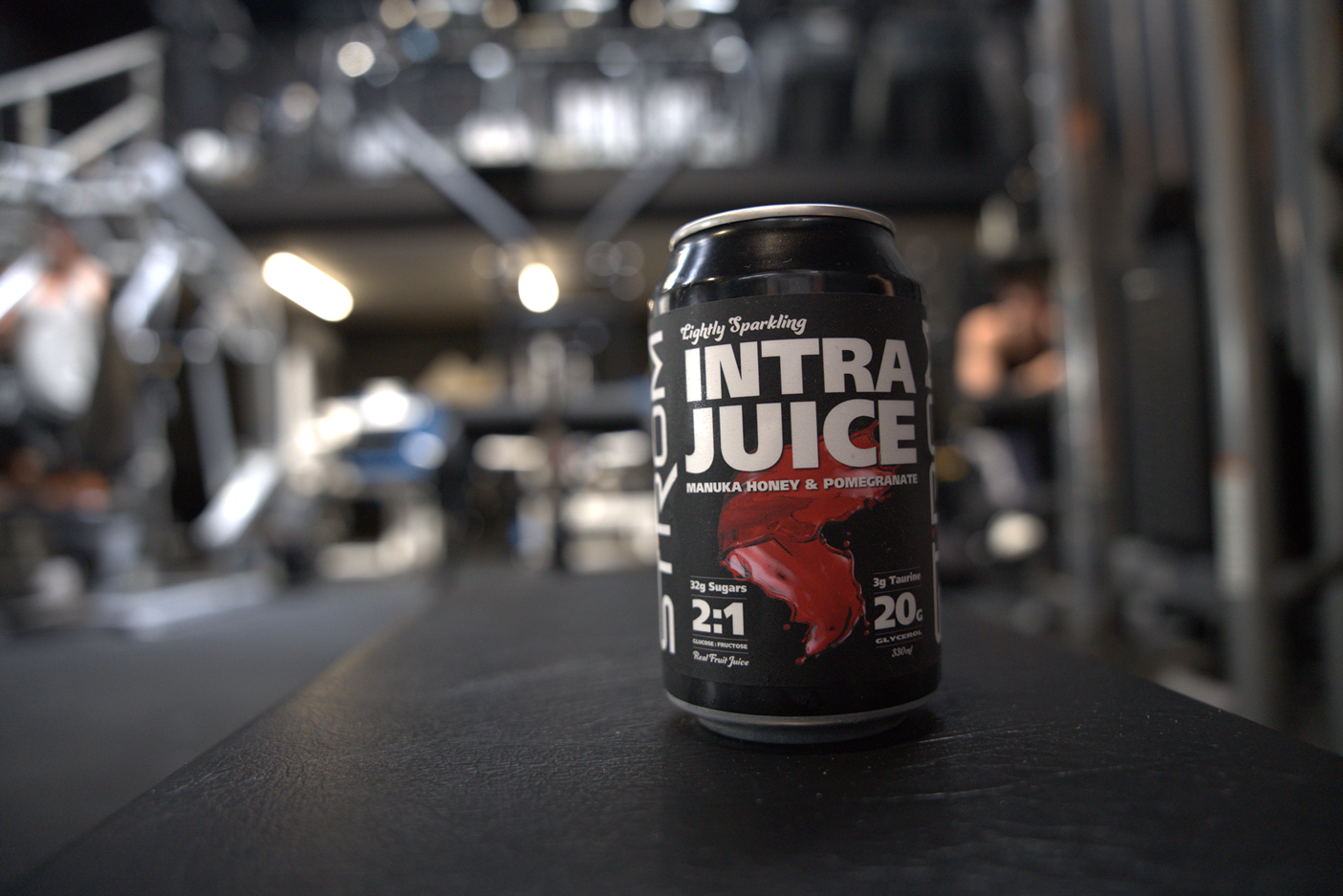 Landscape Shot Strom Sports Intra Juice Pre Workout Product Shot in Gym  | Strom Sports New Zealand 